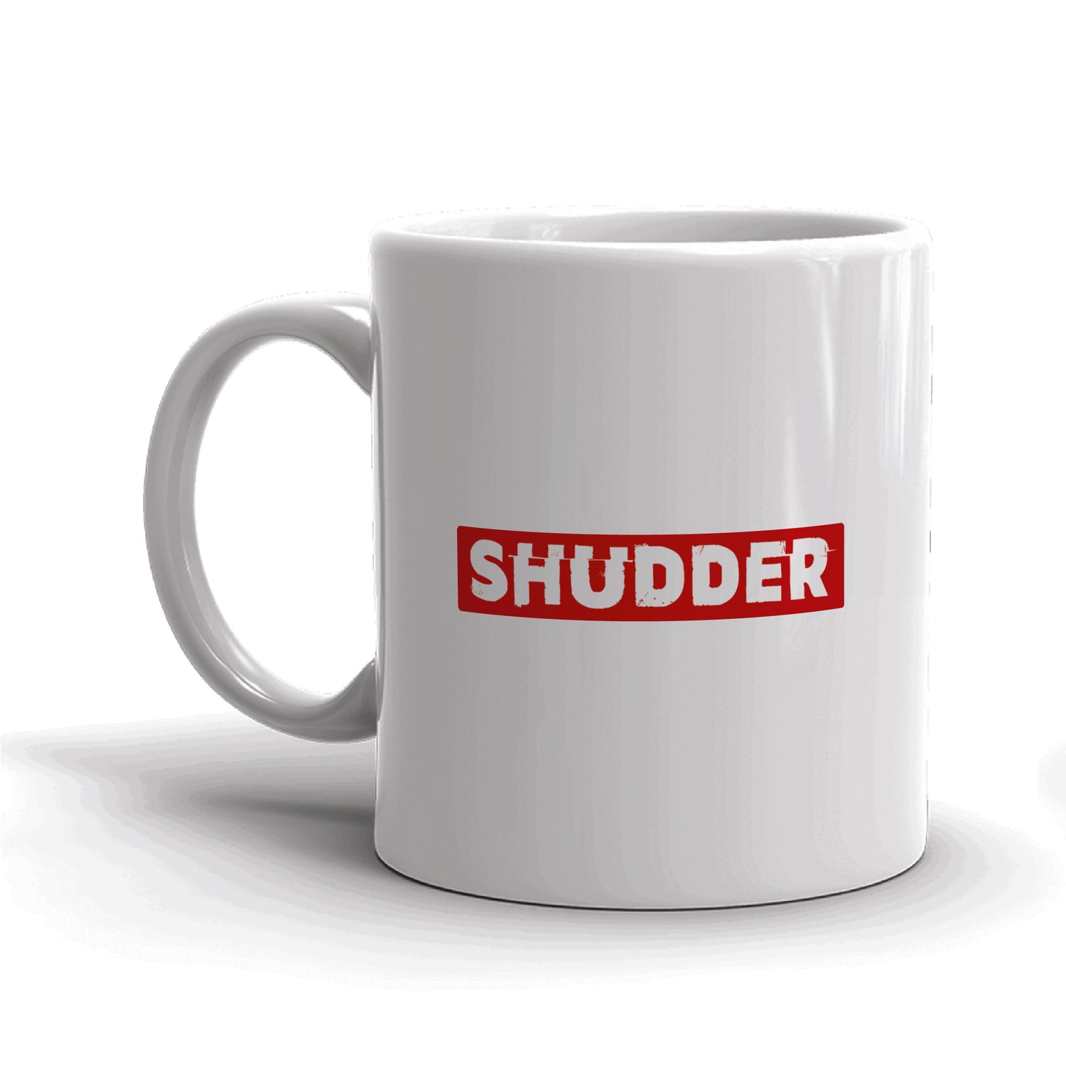 White ceramic coffee mug featuring the black Shudder logo centered on the front