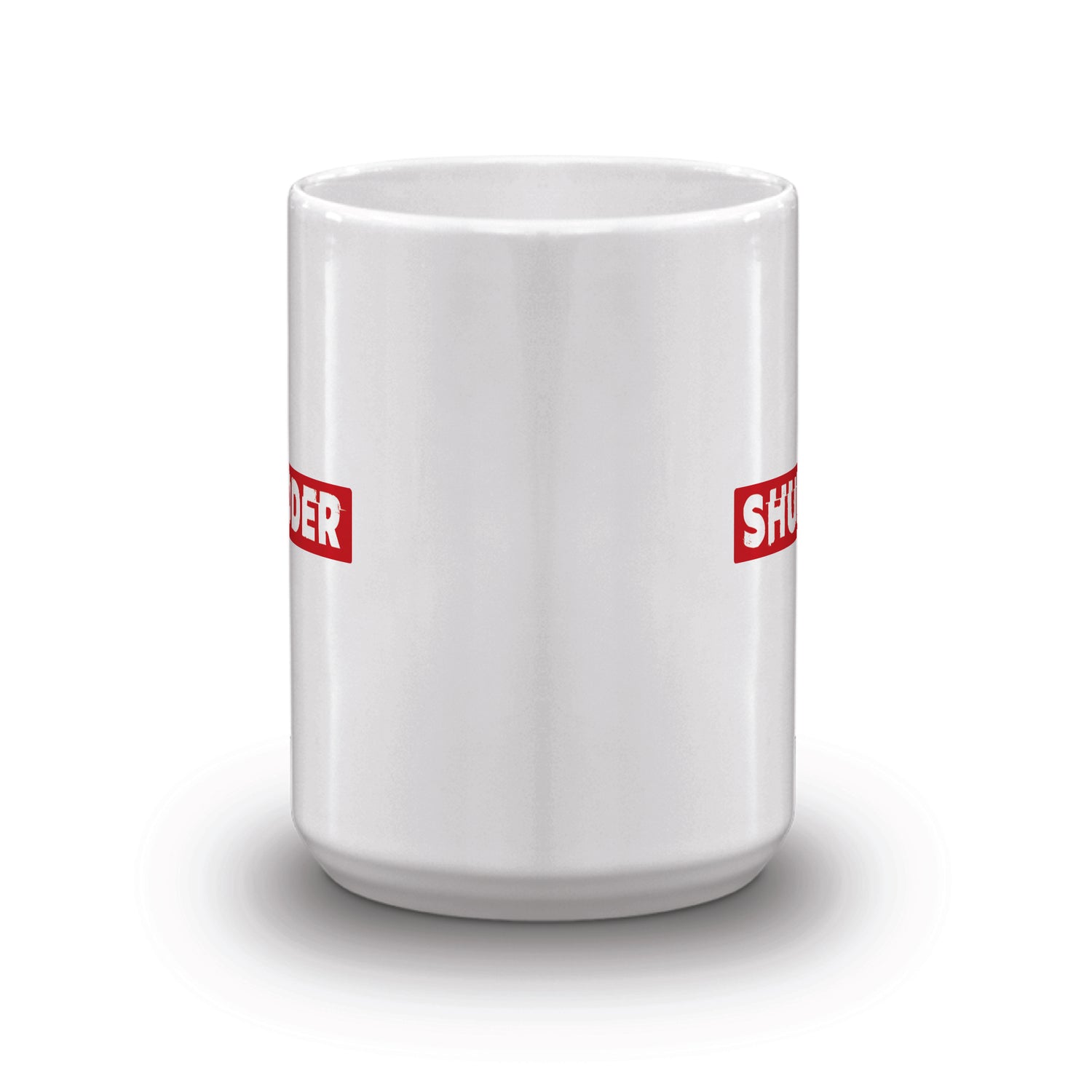 Lifestyle view of the Shudder coffee mug filled with coffee on a kitchen counter